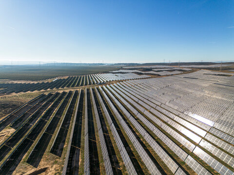 Vast solar farm in Teruel, Spain, showcasing advanced renewable energy technology. Photovoltaic panels converting sunlight into sustainable electricity.