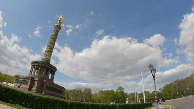 Driving on a roundabout with a view of the Victory Column in Berlin, Germany.