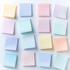 Fototapeta premium A pastel colored sticky notes perfectly arranged on white surface, ideal for a mood board, perfect for back to school concept and office supplies concept.