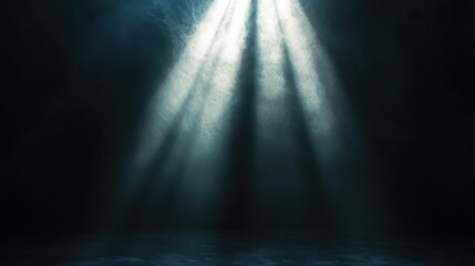 A dark scene illuminated by several beams of light, creating a dramatic and atmospheric effect.
