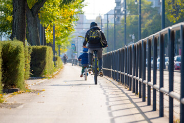 Family cycling in the city