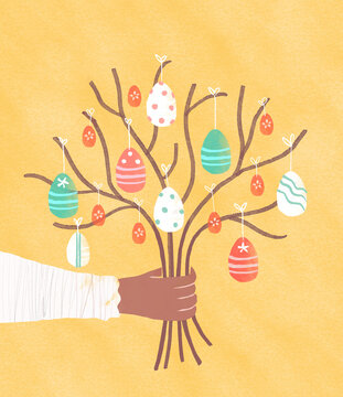 Easter spring background with hand holding colorful painted decorative eggs on tree branches