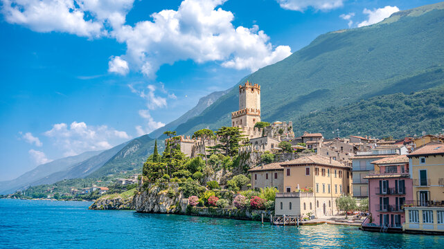Scaliger Castle in Malcesine, Veneto, Italy with a scenic view of the lake and mountains