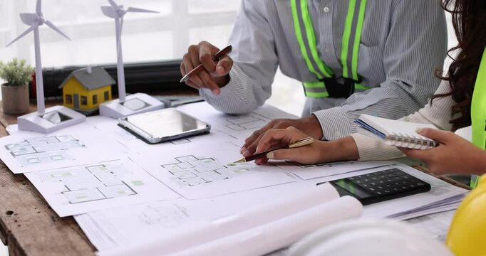 Engineer Teamwork Meeting, Architect contractor meetings of real estate brokers and company presidents to select a model to build a housing estate in writing and presenting to state organizations.	