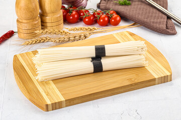 Raw dry white wheat noodles