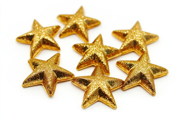 Set of shiny gold Christmas stars, placed on a white background, perfect for holiday décor

