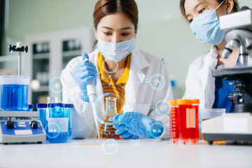 Fototapeta premium Healthcare professional holding Coronavirus COVID-19 vaccine in laboratory study and analyze scientific sample