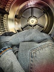 Jeans cloth was put in to washing machine bucket,prepare for clean,
