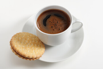 Coffee and round cookie