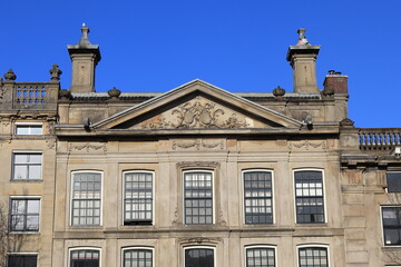 Amsterdam Keizersgracht Canal Building Facade Detail with Chimneys and Blue Sky, Netherlands