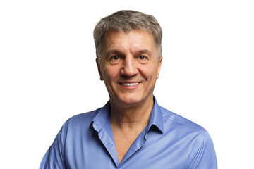 Smiling man in blue shirt posing against plain background with a friendly expression