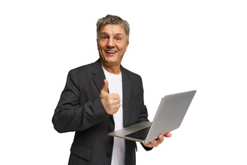 Older man in a suit smiling and giving a thumbs up while holding a laptop
