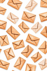 Many envelopes scattered on a white background for mail services and sending letters