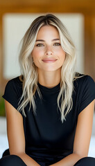 Fototapeta premium Portrait of a smiling woman at home, in a bright, clean room, for wellness