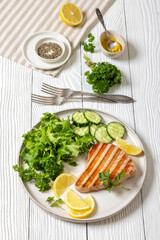 grilled tuna steak on a plate, top view