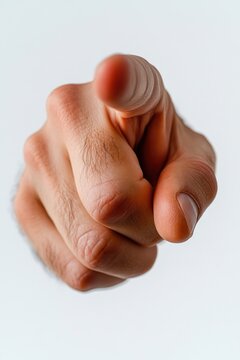 Close up of a human hand pointing finger accusingly.