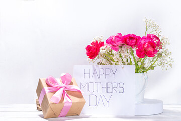 Mothers day gift and flowers background