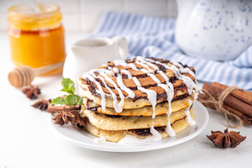 Homemade sweet cinnamon roll pancakes stack
