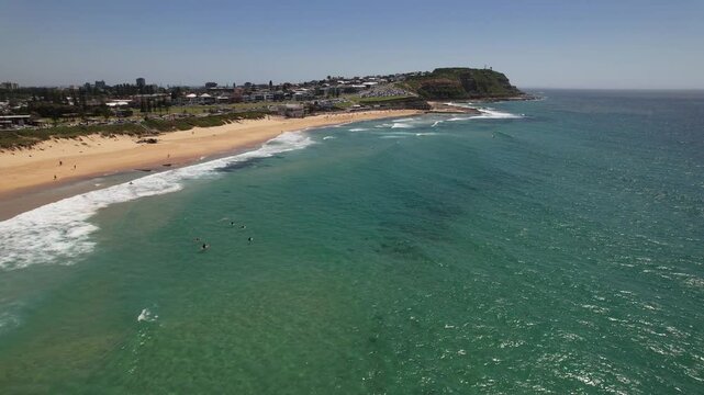 Surfers At Dixon Park Beach In NSW, Australia - Aerial Drone Shot