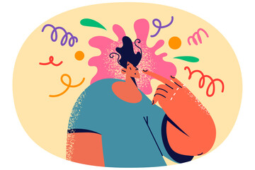 Man with chaos in head involved in creative thinking