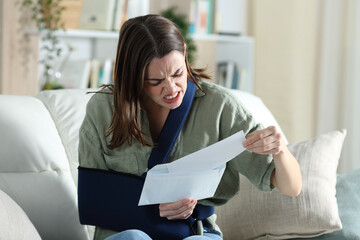Angry convalescent woman reading letter