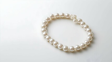 Obraz premium White Pearl Bracelet on White Background