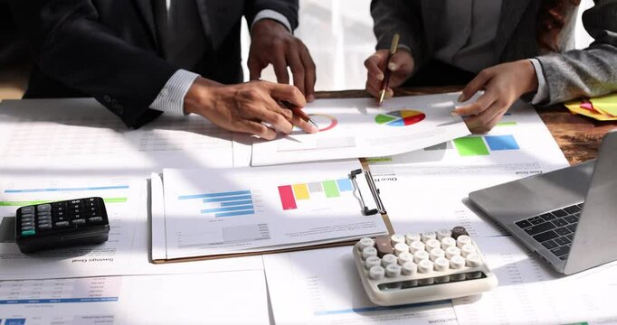 Analyze financial data and accounting record with calculator in meeting office, Accounting company charts and graphs banner, double exposure successful business finance and taxation planning concept.	