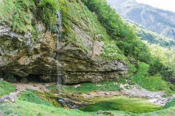 Udine, Italy (16th August 2025): Goriuda Cave and Wtarefall, a spectacular landmark in Dolomites Alps Mountains Italy