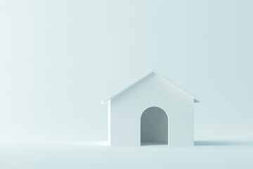 Minimalist white house model on light blue background.