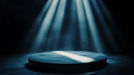 Dark circular platform illuminated by dramatic blue spotlights, ideal for product display or presentation.