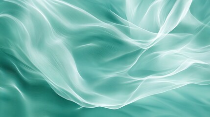 Obraz premium Abstract teal fabric waves, flowing silk texture background.