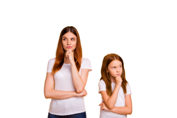 Portrait of minded ladies touching their chin having dreams isolated over yellow background