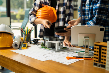 civil engineer or architect business useing calculator about calculate the cost with for working...