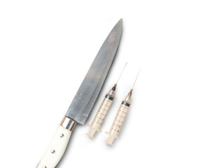 syringe knife photo studio shot on white background
