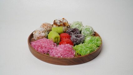 Various market snacks consisting of klepon, awug, jalabria, getuk, putu mayang and cikak are served...