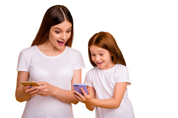 Close-up portrait of two nice amazed cheerful cheery glad person using web 5g connection isolated...