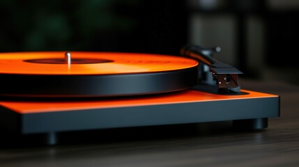 Obraz premium Vintage turntable with orange vinyl record for music lovers and audiophiles