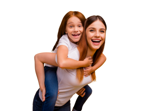 Close-up portrait of two nice attractive lovely cheerful cheery playful person mommy having fun free time piggy backing isolated over bright vivid shine yellow background