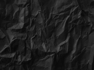 Wrinkled paper black background abstract wall crease grey vintage wallpaper rough floor pattern material surface page elegant retro space crumpled package cardboard backdrop recycling environment.