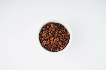 Sichuan pepper on a white background