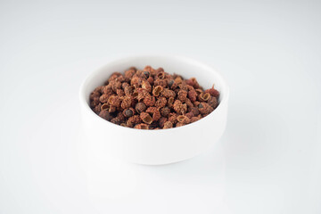 Sichuan pepper on a white background