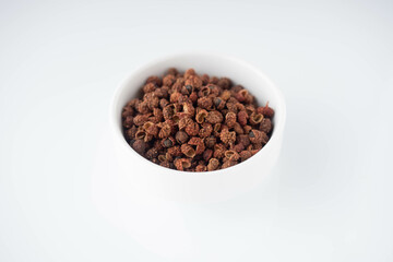 Sichuan pepper on a white background