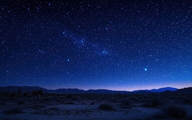 Naklejka premium Starry night sky above an endless desert
