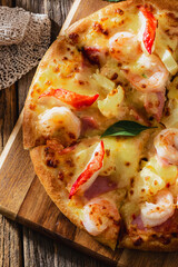 pizza on wooden background