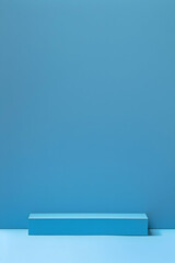 Minimalistic blue background with a rectangular object, creating a serene atmosphere for design