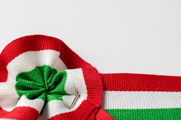 Hungarian tricolor cockade and white background