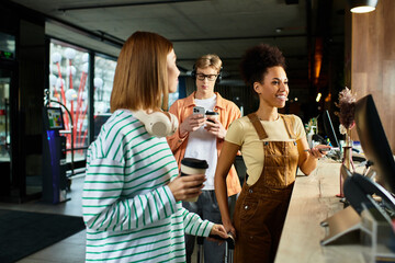 Colleagues enjoy a business trip while checking in at a trendy hotel reception desk