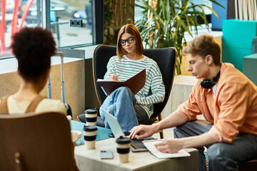 Colleagues collaborating in a cozy hotel lounge during a productive business trip