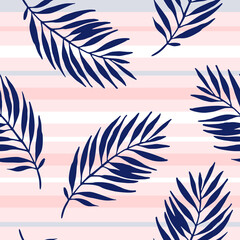 Obraz premium Abstract tropical leaves on striped background. Seamless tropical pattern