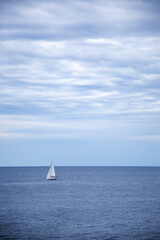 Yacht in the sea. Sailing boat on the sea. Sailboat on the sea. Horizon. Sea and blue sky